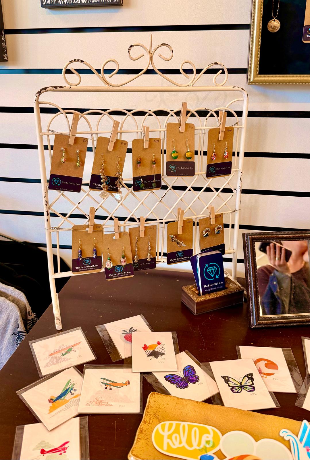 ReCrafted Gem earring display at Willard Art and Framing